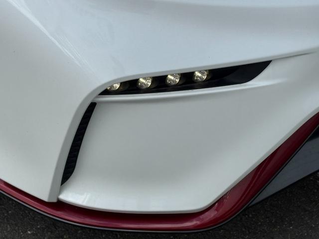ノート ニスモ　禁煙車　専用ステアリング　純正ナビ　フルセグＴＶ　Ｂｌｕｅｔｏｏｔｈ　ＬＥＤヘッドライト　ＬＥＤフォグライト　リアフォグ　プッシュスタート　電動格納ミラー　シガーソケット（16枚目）