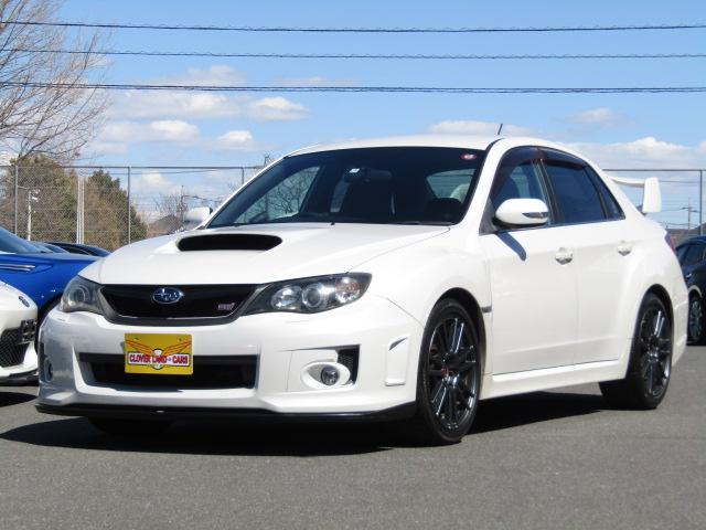 ＷＲＸ　ＳＴｉ　６速ＭＴ　フレキシブルタワーバー　ハーフレザー　ＳＴｉ１８ＡＷ　ＨＩＤライト　パワーシート　ブーストメーター　油温メーター　Ｓｉドライブ　４本出しマフラー　大型リアスポ　スマートキ－(22枚目)