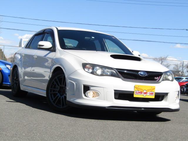 ＷＲＸ　ＳＴｉ　６速ＭＴ　フレキシブルタワーバー　ハーフレザー　ＳＴｉ１８ＡＷ　ＨＩＤライト　パワーシート　ブーストメーター　油温メーター　Ｓｉドライブ　４本出しマフラー　大型リアスポ　スマートキ－(34枚目)