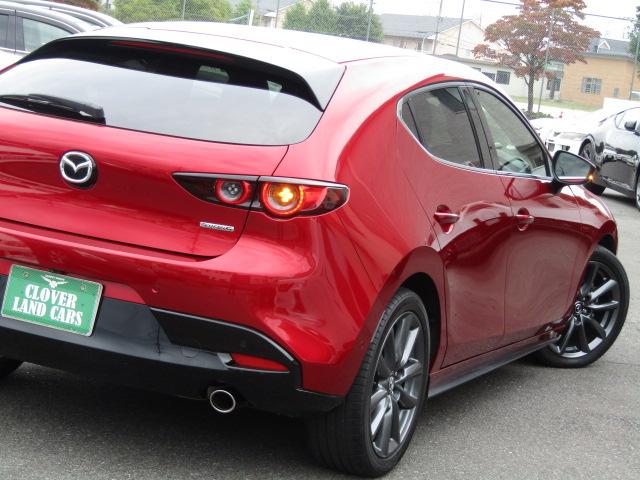 MAZDA3ファストバック 20Sバーガンディ セレクション レーダークルーズ/360°カメラ/マツダコネクトナビ/シートヒーター/ETC/赤革シート/パワーシート/衝突軽減ブレーキ/パドルシフト/ヘッドアップディスプレイ/LED/純正18AW/(65枚目)