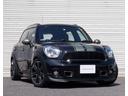 ＭＩＮＩ クーパーＳ　クロスオーバー　ＪＣＷダイナミックエアロＰＫＧ　ステップグリーンレーシングデカール　ＪＣＷ１８インチ　Ｈ＆Ｒダウンサス　ハーフレザー　革巻きステア　パドルＳ　ＪＣＷスカッフプレート　カーボン調パネル　社外ナビ　ＴＶ（3枚目）