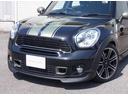 クーパーＳ　クロスオーバー　ＪＣＷダイナミックエアロＰＫＧ　ステップグリーンレーシングデカール　ＪＣＷ１８インチ　Ｈ＆Ｒダウンサス　ハーフレザー　革巻きステア　パドルＳ　ＪＣＷスカッフプレート　カーボン調パネル　社外ナビ　ＴＶ（13枚目）