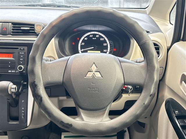 eKワゴン M 禁煙車 純正オーディオ FM AM CD アイドリングストップ 盗難防止装置 ハロゲンヘッドライト 電動格納ミラー リモコンキー フロアマット ドアバイザー 冬タイヤ積み込み(17枚目)