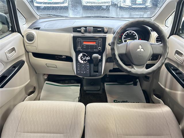 eKワゴン M 禁煙車 純正オーディオ FM AM CD アイドリングストップ 盗難防止装置 ハロゲンヘッドライト 電動格納ミラー リモコンキー フロアマット ドアバイザー 冬タイヤ積み込み(36枚目)