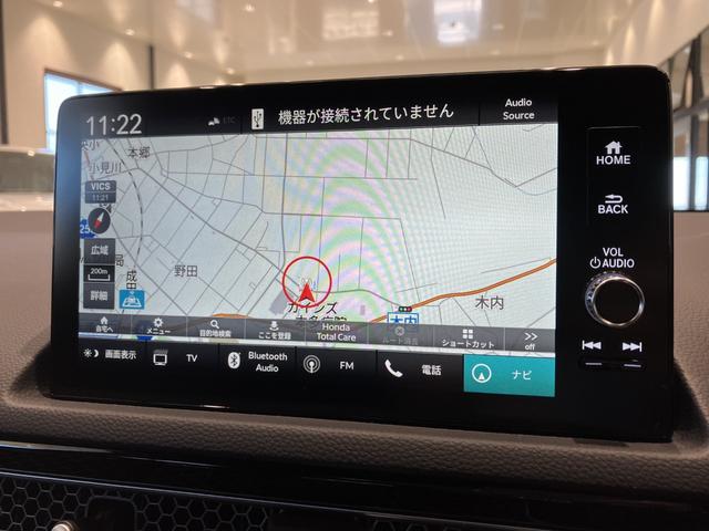 ｅ：ＨＥＶ　運転支援機能　Ｈｏｎｄａ　ＣＯＮＮＥＣＴディスプレー　ＥＴＣ２．０　１０．２インチデジタルメーター　ＢＯＳＥプレミアムサウンドシステム　運転席＆助手席シートヒーター　フロアマット　ワイヤレス充電器(12枚目)