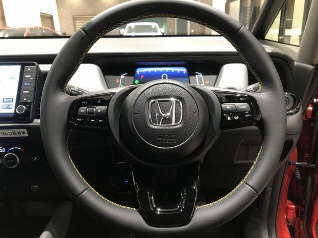 フィット ＲＳ　レンタカー登録　ＲＳ専用エクステリア　運転支援機能　９インチ純正ナビ　ドラレコ　ＥＴＣ　電子制御パーキングブレーキ　ＬＥＤヘッドライト　ＬＥＤルームランプ　フロアマット　１６インチアルミホイール（15枚目）