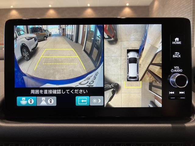 ＺＲ－Ｖ ｅ：ＨＥＶ　Ｚ　ＢＳＩ・後退出庫サポートレス　フロアマット　ＥＴＣ２．０　全周囲カメラ　ワイヤレス充電　ホンダコネクトディスプレー　１０．２インチデジタルメーター　シートヒーター　ＢＯＳＥサウンドシステム　パワーテールゲート　本革シート（10枚目）