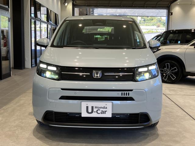 フリード エアー EX フロアマット 9インチ純正ナビ ETC ドラレコ シートヒーター 両側パワスラ ブラインドスポットモニター リアクーラー 本革巻ステアリングホイール 360°スーパーUV・IRカット レンタカー登録(3枚目)