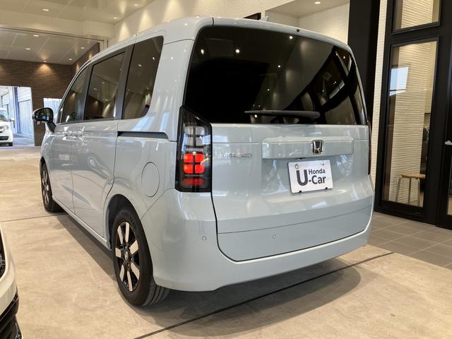 フリード エアー EX フロアマット 9インチ純正ナビ ETC ドラレコ シートヒーター 両側パワスラ ブラインドスポットモニター リアクーラー 本革巻ステアリングホイール 360°スーパーUV・IRカット レンタカー登録(5枚目)