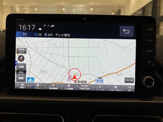 フリード エアー EX フロアマット 9インチ純正ナビ ETC ドラレコ シートヒーター 両側パワスラ ブラインドスポットモニター リアクーラー 本革巻ステアリングホイール 360°スーパーUV・IRカット レンタカー登録(10枚目)