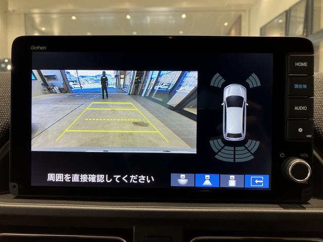 フリード エアー EX フロアマット 9インチ純正ナビ ETC ドラレコ シートヒーター 両側パワスラ ブラインドスポットモニター リアクーラー 本革巻ステアリングホイール 360°スーパーUV・IRカット レンタカー登録(11枚目)