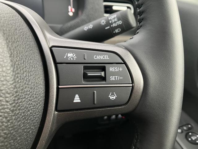 フリード エアー EX フロアマット 9インチ純正ナビ ETC ドラレコ シートヒーター 両側パワスラ ブラインドスポットモニター リアクーラー 本革巻ステアリングホイール 360°スーパーUV・IRカット レンタカー登録(25枚目)