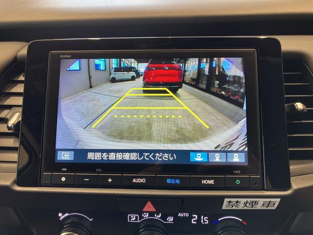 フィット ｅ：ＨＥＶホーム　フロアマット　８インチ純正ナビ　ＥＴＣ　フルＬＥＤヘッドライト　運転支援　電子制御パーキングブレーキ　オートブレーキホールド　ＬＥＤルームランプ　フルオートエアコン　コンビシート　スマートキー（10枚目）