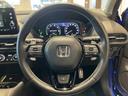 ｅ：ＨＥＶ　Ｚ　ＢＳＩ・後退出庫サポートレス　フロアマット　ＥＴＣ２．０　全周囲カメラ　ワイヤレス充電　ホンダコネクトディスプレー　１０．２インチデジタルメーター　シートヒーター　ＢＯＳＥサウンドシステム　パワーテールゲート　本革シート（21枚目）
