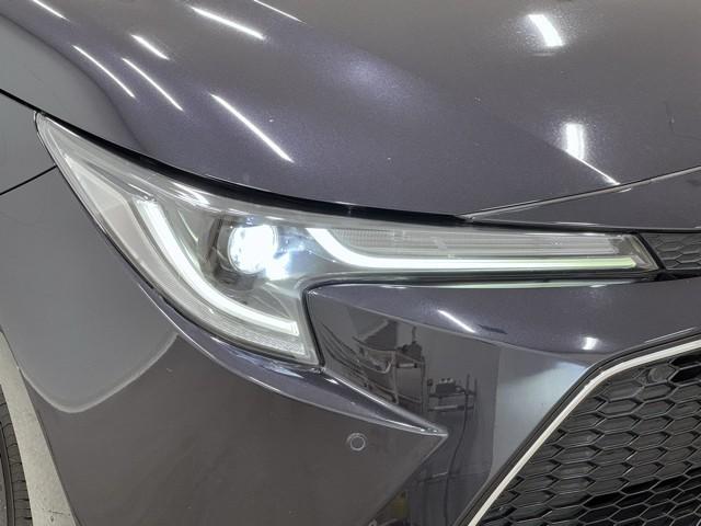カローラツーリング ハイブリッド　ダブルバイビー　追突軽減ブレーキ　バックモニタ　横滑防止　スマキー　ＬＥＤライト　Ａストップ　デュアルエアバッグ　エアコン　オートクルーズ　サイドエアバッグ　ＥＴＣ付　ナビ　ＰＳ　キーフリー　ＡＢＳ　エアバック（19枚目）