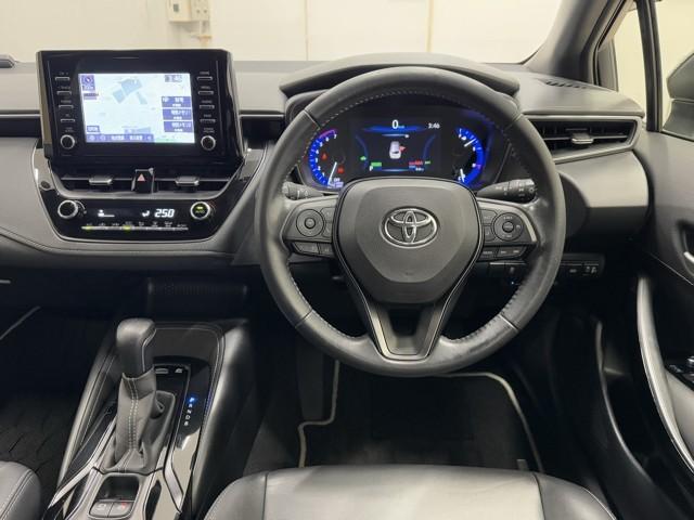 カローラツーリング ハイブリッド ダブルバイビー 追突軽減ブレーキ バックモニタ 横滑防止 スマキー LEDライト Aストップ デュアルエアバッグ エアコン オートクルーズ サイドエアバッグ ETC付 ナビ PS キーフリー ABS エアバック(4枚目)