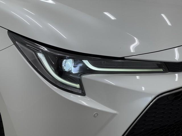 カローラツーリング ハイブリッド ダブルバイビー 追突軽減ブレーキ バックモニタ 横滑防止 スマキー LEDライト Aストップ デュアルエアバッグ エアコン オートクルーズ サイドエアバッグ ETC付 ナビ PS キーフリー ABS エアバック(16枚目)
