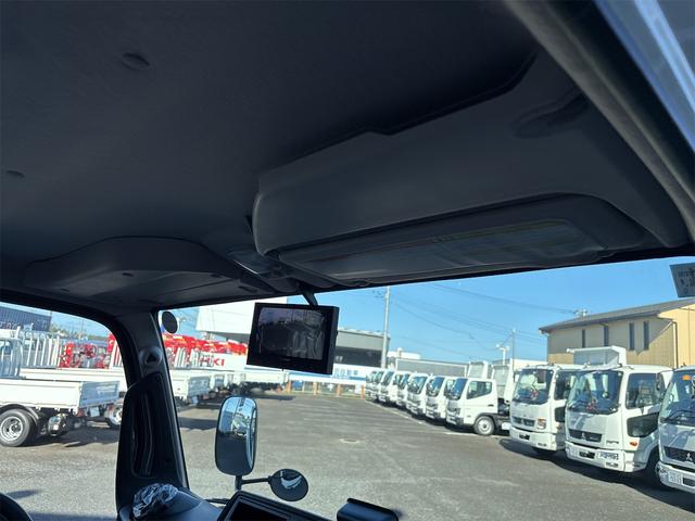 キャンター 　３ｔ　６ＡＴ　新明和製　強化ダンプ支柱付　ＤＵＯＮＩＣ　液晶メーター　アイドリングストップ　バックモニター　Ｂｌｕｅｔｏｏｔｈ対応ラジオ　ＬＥＤヘッドライト　マニュアルエアコン　アクティブサイド（11枚目）