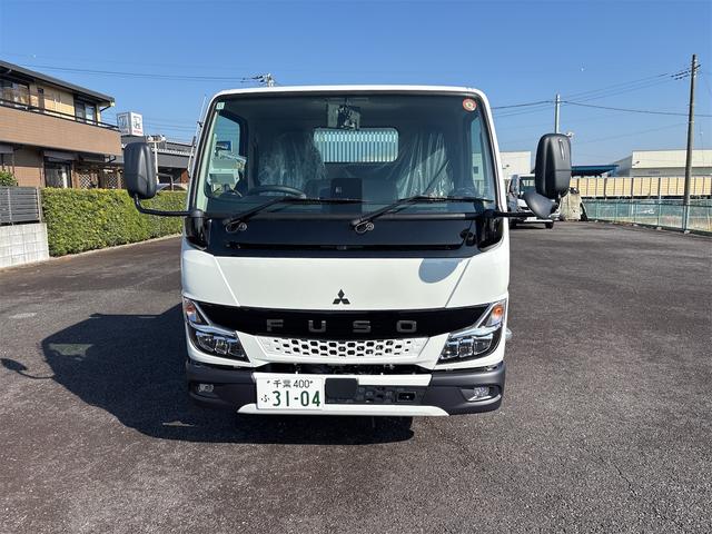 キャンター 全低床ダンプ　新明和製ローダーダンプ　３ｔ　５ＭＴ　助手席サンバイザー　助手席電動格納ミラー　バックモニター　スマートキー　ＬＥＤヘッドライト　Ｂｌｕｅｔｏｏｔｈ対応オーディオ（2枚目）