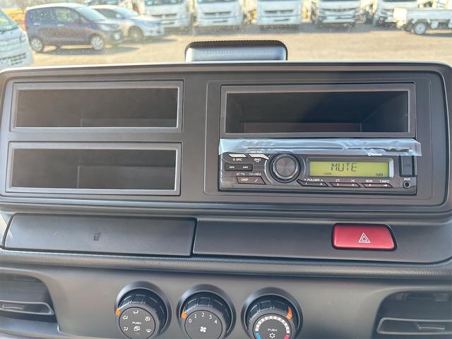 キャンター 全低床ダンプ　新明和製ローダーダンプ　３ｔ　５ＭＴ　助手席サンバイザー　助手席電動格納ミラー　バックモニター　スマートキー　ＬＥＤヘッドライト　Ｂｌｕｅｔｏｏｔｈ対応オーディオ（9枚目）