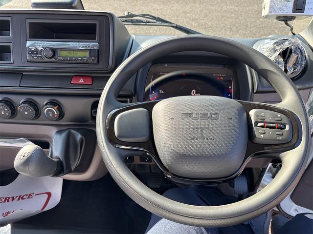 キャンター 全低床ダンプ　新明和製ローダーダンプ　３ｔ　５ＭＴ　助手席サンバイザー　助手席電動格納ミラー　バックモニター　スマートキー　ＬＥＤヘッドライト　Ｂｌｕｅｔｏｏｔｈ対応オーディオ（14枚目）