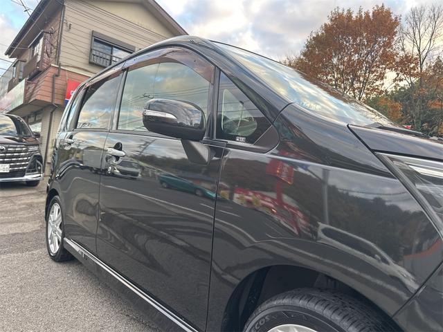 ムーヴ カスタム　ＲＳ　☆インタークーラーターボ・プッシュスタート・スマートキー・純正ナビ＆ＴＶ・１５インチＡＷ・ＬＥＤライト・フォグランプ・ウインカーミラー・ＭＯＭＯステアリング・（26枚目）