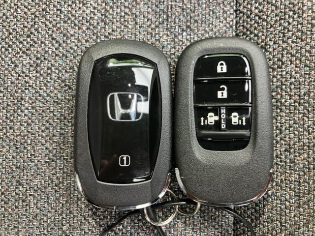 フリード eHEVエアー 保証書/純正 8インチ ナビ/ホンダセンシング/両側電動スライドドア/車線逸脱防止支援システム/パーキングアシスト バックガイド/登録済未使用車/ヘッドランプ LED/USBジャック バックカメラ(53枚目)