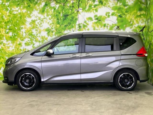 フリード クロスターホンダセンシング 新品タイヤ/保証書/ディスプレイオーディオ/衝突安全装置/両側電動スライドドア/車線逸脱防止支援システム/ヘッドランプ LED/ETC/EBD付ABS/横滑り防止装置/アイドリングストップ 記録簿(2枚目)