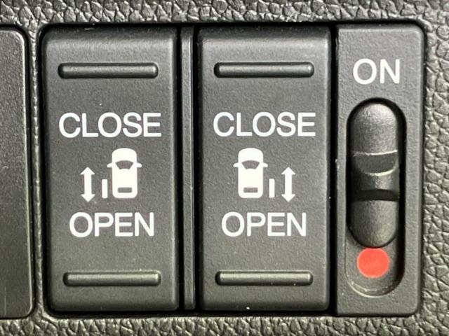 フリード クロスターホンダセンシング 新品タイヤ/保証書/ディスプレイオーディオ/衝突安全装置/両側電動スライドドア/車線逸脱防止支援システム/ヘッドランプ LED/ETC/EBD付ABS/横滑り防止装置/アイドリングストップ 記録簿(27枚目)