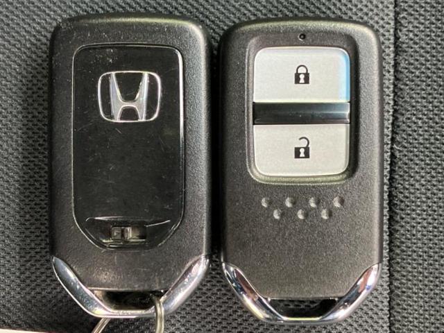 フィット 13G・Fパッケージ 保証書/純正 SDナビ/ドライブレコーダー 前後/ETC/EBD付ABS/横滑り防止装置/アイドリングストップ/バックモニター/フルセグTV/DVD/エアバッグ 運転席/エアバッグ 助手席 DVD再生(47枚目)