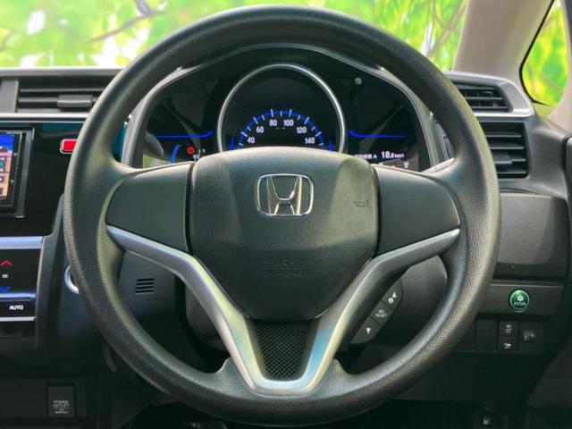 フィットハイブリッド ハイブリッド・Fパッケージ 社外 SDナビ/Bluetooth接続/ETC/EBD付ABS/横滑り防止装置/アイドリングストップ/フルセグTV/DVD/エアバッグ 運転席/エアバッグ 助手席/アルミホイール 社外 15インチ(14枚目)