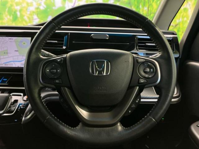 ステップワゴンスパーダ スパーダハイブリッドＧ・ＥＸホンダセンシング　保証書／社外　９インチ　ＳＤナビ／フリップダウンモニター／衝突安全装置／両側電動スライドドア／シートヒーター　前席／車線逸脱防止支援システム／シート　ハーフレザー／ドライブレコーダー　社外　ドラレコ（15枚目）