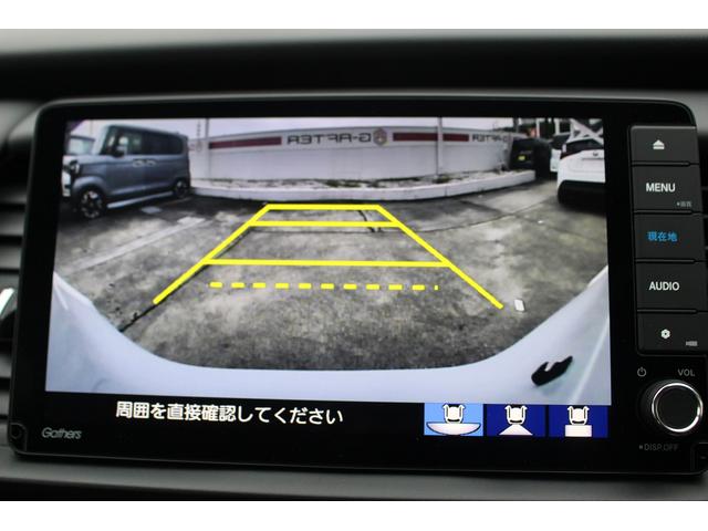フィット e:HEVリュクス バックカメラ/LEDヘッドライト/衝突軽減ブレーキシステム/半革シート/シートヒーター/レーダークルーズコントロール/ETC/純正17AW/プッシュスタート/フォグライト/電動格納ミラー(4枚目)