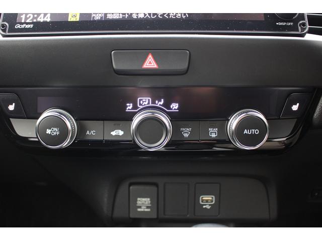フィット e:HEVリュクス バックカメラ/LEDヘッドライト/衝突軽減ブレーキシステム/半革シート/シートヒーター/レーダークルーズコントロール/ETC/純正17AW/プッシュスタート/フォグライト/電動格納ミラー(33枚目)