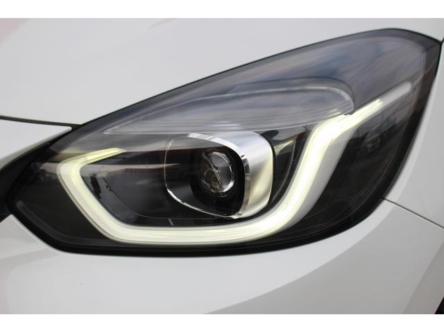 フィット ｅ：ＨＥＶベーシック　禁煙車　ナビ　バックカメラ　衝突軽減ブレーキシステム　ＬＥＤヘッドライト　レーダークルーズコントロール　ビルトインＥＴＣ　プッシュスタート　レーンアシスト　誤発進抑制機能　オートハイビーム（19枚目）