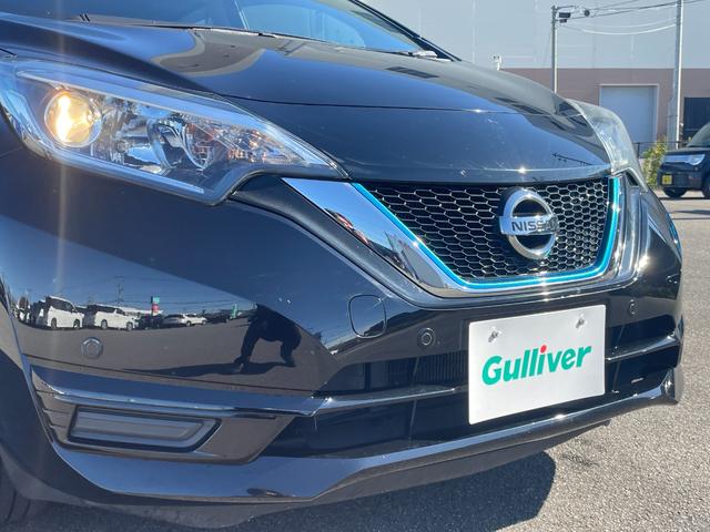 ノート 　４ＷＤ　衝突被害軽減　社外メモリナビ　ＣＤ　ＤＶＤ　ＢＴ　ワンセグ　ＵＳＢ　ＡＵＸ　バックカメラ　オートライト　純正１５インチアルミホイール　レーンキープアシスト　コーナーセンサー　フロアマット（25枚目）