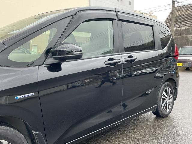 フリードハイブリッド ハイブリッド・EX 衝突被害軽減システム 純正SDナビ CD DVD BT フルセグ USB AUX MSV バックカメラ 両側パワースライドドア アダプティブクルーズコントロール LEDオートライト シートヒーター(34枚目)