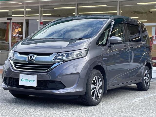 フリード＋ハイブリッド ハイブリッドＧ・ホンダセンシング　ワンオーナー　４ＷＤ　スマートキー　純正ナビ　Ｂｌｕｅｔｏｏｔｈ．ＣＤ．ＡＭ／ＦＭ　フルセグＴＶ　ホンダセンシング　ハーフレザーシート　シートヒーター　ＥＴＣ　両側パワースライドドア　バックカメラ（3枚目）