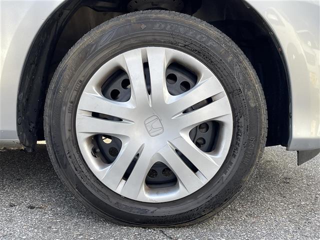 フィット Ｇ　ワンオーナー　４ＷＤ　ナビ　ＣＤ　ＡＭ　ＦＭ　バックカメラ　ＥＴＣ　盗難防止装置システム　リモコンキー　ＡＢＳ　ハロゲンヘッドライト　保証書　取扱説明書（11枚目）