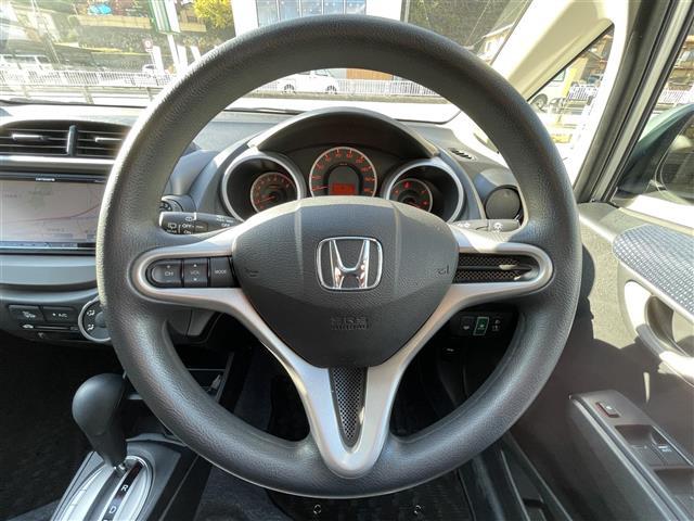 フィット Ｇ　ワンオーナー　４ＷＤ　ナビ　ＣＤ　ＡＭ　ＦＭ　バックカメラ　ＥＴＣ　盗難防止装置システム　リモコンキー　ＡＢＳ　ハロゲンヘッドライト　保証書　取扱説明書（24枚目）