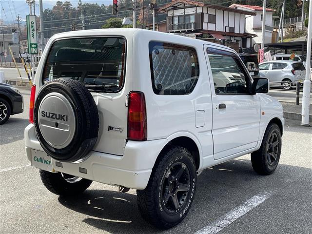 ジムニー ＸＧ　４ＷＤ　背面タイヤ　ディスプレイオーディオ　Ｂｌｕｅｔｏｏｔｈ　ＣＤ　ＤＶＤ　ＡＭ　ＦＭ　ＡＵＸ　ｉＰｏｄ　バックカメラ　ＥＴＣ　リモコンキー　純正フロアマット　社外ドリンクホルダー　取扱説明書（6枚目）