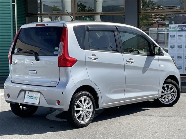 ｅＫワゴン Ｍ　ｅ－アシスト　４ＷＤ　ワンオーナー　ＡＵＸあり　純正フロアマット　フルフラットシート　シートヒーターＤ席　社外１４インチＡＷ　ハロゲンオートライト　衝突被害軽減システム　コーナーセンサー前後　ドアバイザー（16枚目）