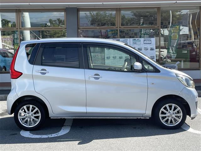 ｅＫワゴン Ｍ　ｅ－アシスト　４ＷＤ　ワンオーナー　ＡＵＸあり　純正フロアマット　フルフラットシート　シートヒーターＤ席　社外１４インチＡＷ　ハロゲンオートライト　衝突被害軽減システム　コーナーセンサー前後　ドアバイザー（18枚目）
