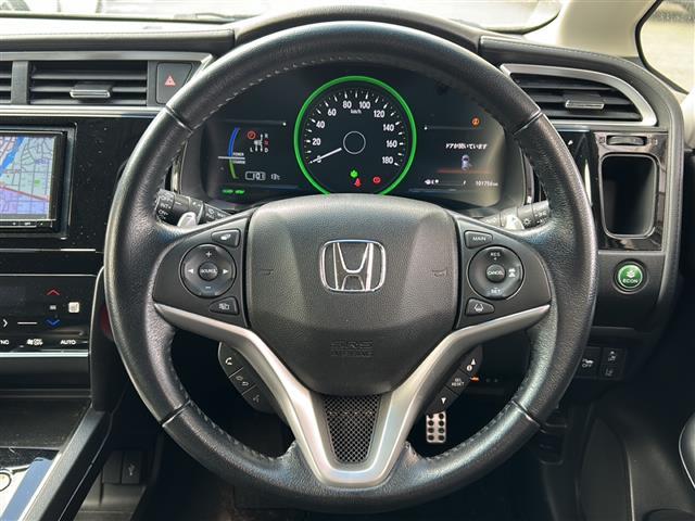 シャトル ハイブリッドX ホンダセンシング ワンオーナー 社外ナビ バックカメラ ビルトインETC レーダークルコン フルセグTV フロントワイパーデアイサー 衝突軽減装置 前席シートヒーター ナビステアリングスイッチ 鉄ホイール冬タイヤ有(5枚目)