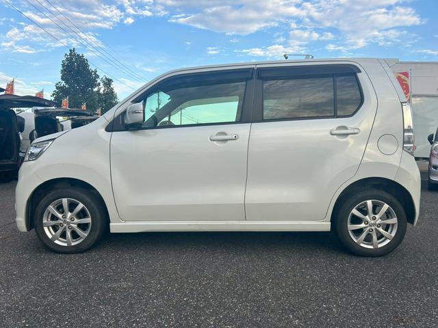 ワゴンＲスティングレー Ｘ　修復歴なし　ナビ　スマートキー　プッシュスタート　アイドリングストップ　ＨＩＤヘッドライト　オートエアコン　ドアバイザー　プライバシーガラス　ウインカーミラー　ベンチシート　整備保証付（9枚目）