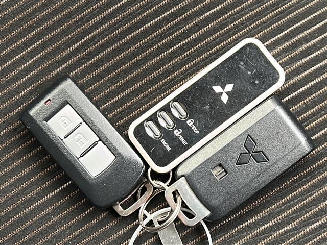 eKカスタム G SDナビ バックC フルセグ BT ETC スマートキー スペアキー D席シートヒーター 電格ミラー 純正ドアバイザー 純正フロアマット 黒革巻きステアリング HID 社外冬タイヤ付14インチAW車載(11枚目)