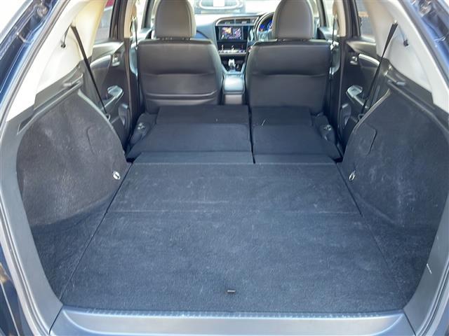 シャトル ハイブリッドＸ　４ＷＤ　ナビ　フルセグＴＶ　シティブレーキ　クルーズコントロール　ＥＴＣ　パドルシフト　ハーフレザーシート　革巻きステアリング　オートライト　フォグランプ　社外アルミホイール　横滑り防止　スマートキー（23枚目）