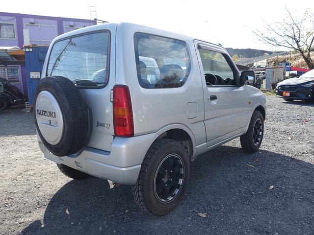 ジムニー ＸＧ　走行１２８００キロ　５速マニュアル車　車両鑑定書付　車検９年５月　社外アルミ　キーレス　禁煙車（15枚目）