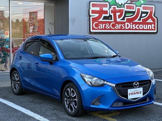 デミオ 15MB 純正CD,ラジオデッキ・USB・AUX・マニュアルエアコン・ステアリングリモコン・ETC・プッシュスタート・アイドリングストップ・横滑り防止・光軸調整・電動格納ドアミラー・スマートキー(6枚目)