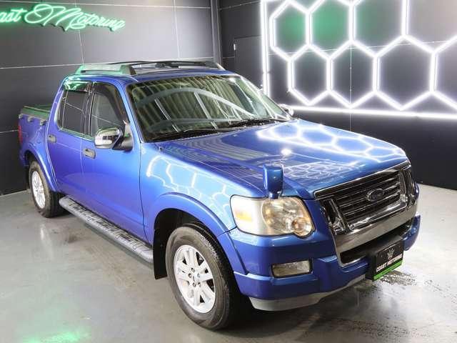 エクスプローラースポーツトラック ＸＬＴ　トノカバー／クルーズコントロール／ｃａｒｒｏｚｚｅｒｉａメモリーナビ／サンルーフ／ルーフレール／ＨＩＤヘットランプ／ＥＴＣ／地デジ／バックモニター／純正１７インチホイール／Ｂｌｕｅｔｏｏｔ／電動シート（6枚目）